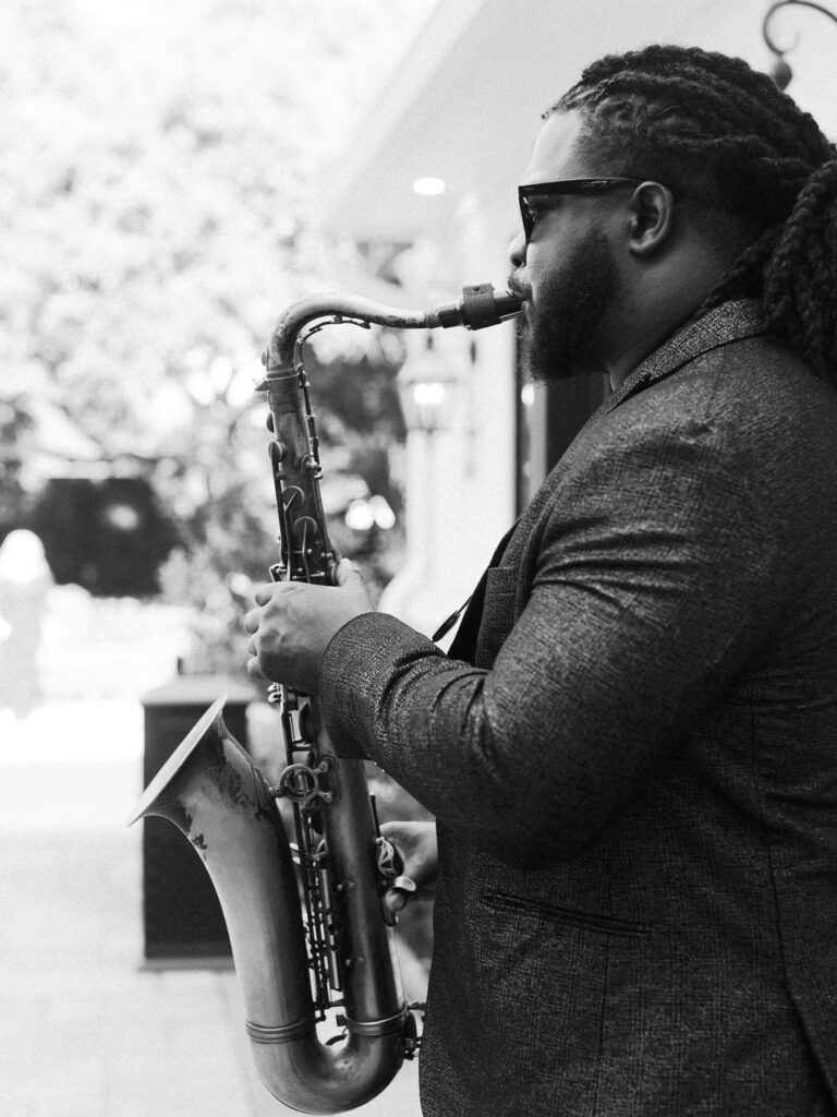 saxophonist at the cocktail hour of a wedding in the woodlands 